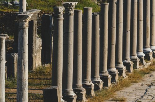 Historical Roman columns in Perge, Turkey during a sunny summer day.