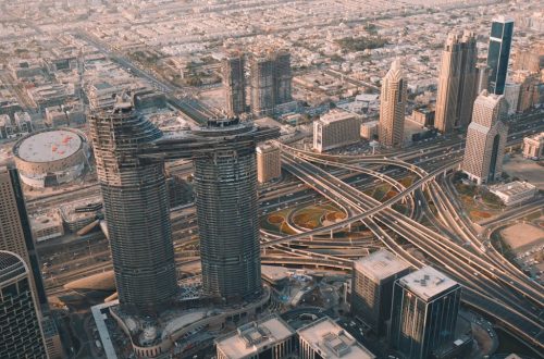 A stunning aerial shot of Dubai showcasing its modern architecture and sprawling urban landscape.