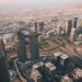 A stunning aerial shot of Dubai showcasing its modern architecture and sprawling urban landscape.