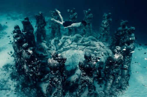 Diver exploring the underwater sculpture circle in Gili Meno, Indonesia.