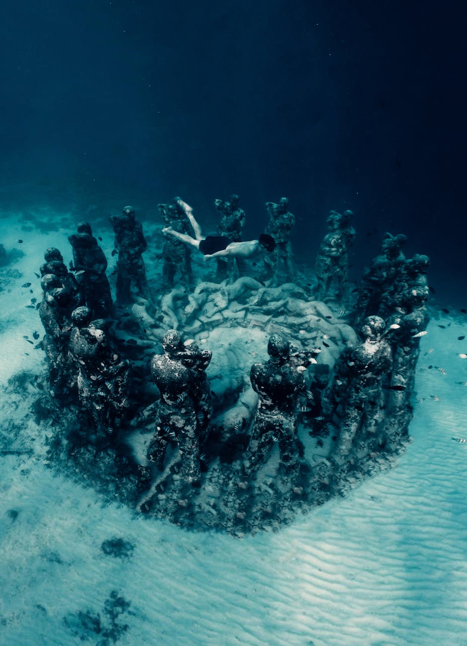 Diver exploring the underwater sculpture circle in Gili Meno, Indonesia.