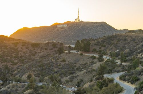 Captivating sunset over the iconic Hollywood Sign and rugged hills of Los Angeles.