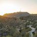 Captivating sunset over the iconic Hollywood Sign and rugged hills of Los Angeles.