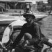 Black and white portrait of a local fisherman on a boat in Cairo, Egypt. Capturing daily life on the Nile.