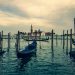 Beautiful view of gondolas on Venice's canals with San Giorgio Maggiore in the background.
