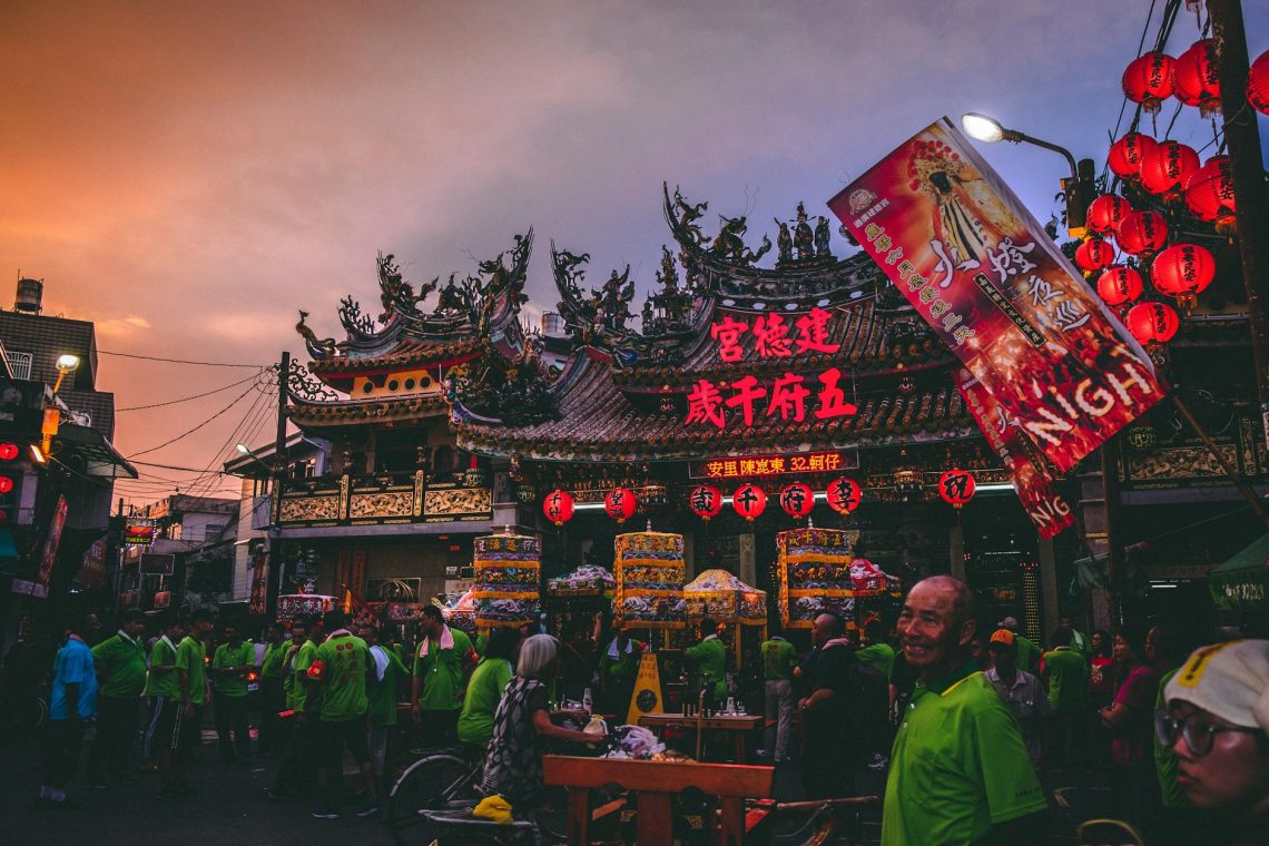 Colorful lantern festival in Taiwan with lively crowds and traditional decorations.